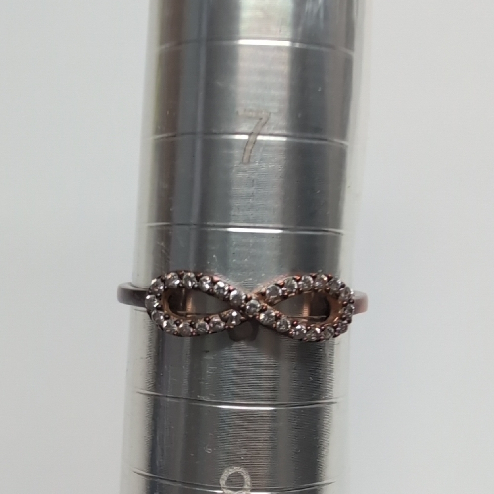 Elegant Iridescent Sterling Silver Infinity Ring